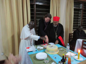 FromLefttorightCardinalWamala2CMrsDoodyandCardinalBerhaneyesuscutacaketomarkthelaunch