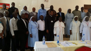 CardinalWamala28centre29posewiththeparticipantsforagroupphoto
