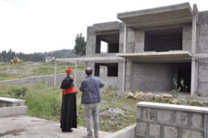 H.E. Cardinal Berhaneyesus admires part of the uncompleted premises of the Catholic University