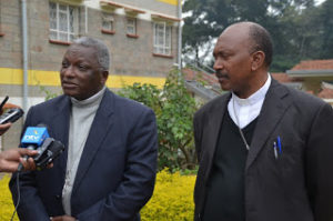 Chairman of Catholic Health Commission Rt. Rev. Paul Kariuki (left) accompanied by Vice Chairman of the Commission Rt. Rev. Joseph Mbatia answering questions from the press in regard with the Church's stand on Vaccination campaigns