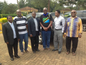 Bishop Libena (third from left) accompanied by  some other Pilgrims to Namugongo Uganda