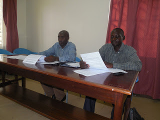 Mr Kkonde (left) and the ACCPU chairperson,  Simon Peter Byakatonda at a past ACCPU function