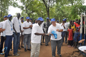 fr-aristide-and-arra-representative-cutting-the-ribbon