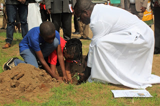 Catholic Children from Archdiocese of Lilongwe  planting trees to conserve environment 