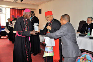 Rt. Rev. Woldeghiorghis, OFM, Cap,  Apostolic Vicar of Hossana receiving the candle