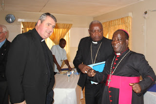 Fr. Andrew Small interracting with Archbishop  Thomas Msusa  and Bishop Martin Mtumbuka
