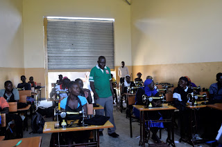 Youth undergoing tailoring training