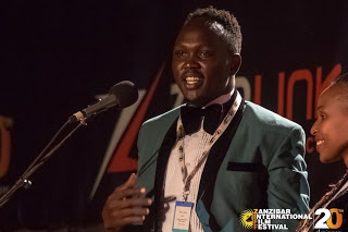 Steven Aayeni Receives SIGNIS Award for Best East African  Talent on his film Kony-Order From Above,  at ZIFF 2017 [photo Peter Bennett]