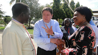 Right: Hon Jenista Mhagama, Minister of States in the  Office of Prime Minister in Tanzania sharing a word with H.E.  João Cardinal Bráz de Aviz, Prefect of the  Congregation for Institute of Consecrated Life and  Societies of  Apostolic Life and  Rt. Rev. Renatus Mkwande, Bishop in charge of  Religious in Tanzania