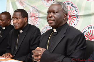 Rt. Rev. Philip Anyolo (right), KCCB Chairman and Bishop of Homabay during the press conference