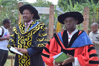 (L) Dr. Kebwe Steven, Morogoro Regional Commissioner,  and (R) Rt. Rev. Salutaris Libena, Bishop of Ifakara