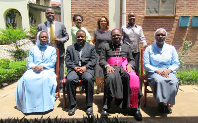 Participants Group Photo with Archbishop ECM Secretary General  Rev. Fr. Henry Saindi and Most Rev. Tarcisius Gervazio Ziyaye  Archbishop of Lilongwe