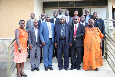 Bishop Ssemogerere and Msgr Kauta pose for a group photo with the new UNCCLA Executive Committee members