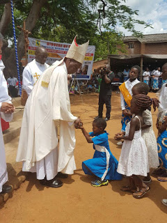 Rt. Rev. Emmanuel Kanyama  Blesses the Children