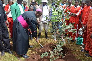 Rt. Rev. David Kamau, Auxiliary Bishop of Nairobi leads faithful from the Archdiocese in Tree Planting