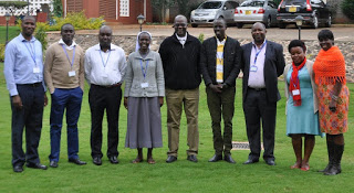 Some of the participants pose for a group photo with AMECEA Social Communications Coordinator Rev. Fr. Chrisantus Ndaga (3rd from right) 