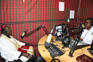 Bishop John Oballa hosted by one of the Osotua radio presenter Christabel known as Lady Tabs