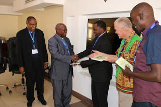 Bishop Kilaini, Auxiliary of Bukoba Receives the New Revised 2nd Edition of the Training handbook