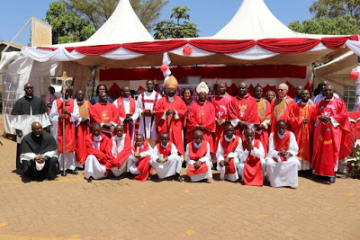 Members of NSCCA join clergy at Uecharistic celebrations  at Holy Cross Dandora. The occasion coincided with the Feast of the Parish  Exaltation of the Cross where 300 candidates received the Sacrament of  Confirmation. Rt. Rev. John Oballa Owaa of Ngong  Diocese was the main celebrant.