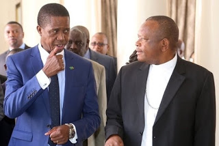 President Edgar Lungu confers with Vice Chair of the Conference of Catholic Bishops of Democratic Republic of Congo Bishop Fridolin Ambongo at State House.