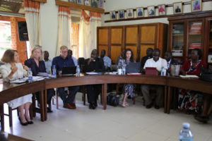 A section of PEPFAR representatives with Bishop Muhiirwa