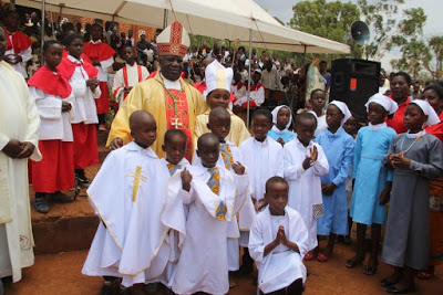 Archbishop Msusa with children who aspires to be priests and sisters 