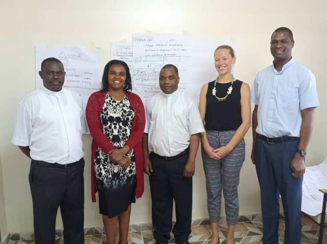 From (L) Rev. Fr. Paul Igweta, Coordinator AMECEA Integral Human Development Department, Ms. Pauline Wakibiru AMECEA Pastoral Department, Rev. Fr. Emmanuel Chimombo Deputy Secretary General and Coordinator AMECEA Pastoral Department, Ms. Isabel de Bruin Cardoso, a Consultant and facilitator of the meeting and Fr. Andrew Kaufa, Coordinator AMECEA Social Communications Department