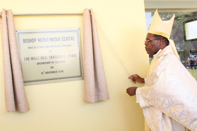 Most Rev. Tarcisius Gervazio Ziyaye, Archbishop of Lilongwe Unvailing the plague during the official enauguration of Montfort Media Center in Lilongwe where the National Catholic TV station TV Luntha is located