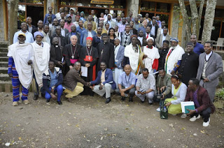 Participants of the meeting together with Catholic  Church leaders, CRS and World Vision Members