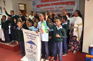 Students of Catholic Cathedral School choir  singing at the opening of the meeting