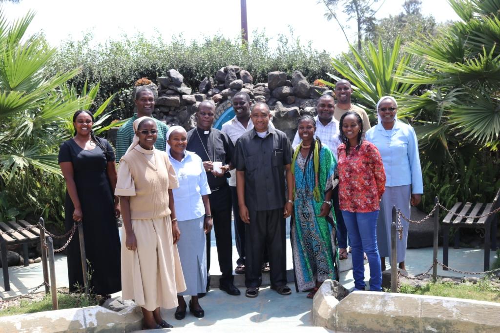 AMECEA Secretariat Staff Members with Bishop Maurice Muhatia of  Nakuru Diocese during the Secretariat Staff Annual Planning  Meeting held in Nakuru