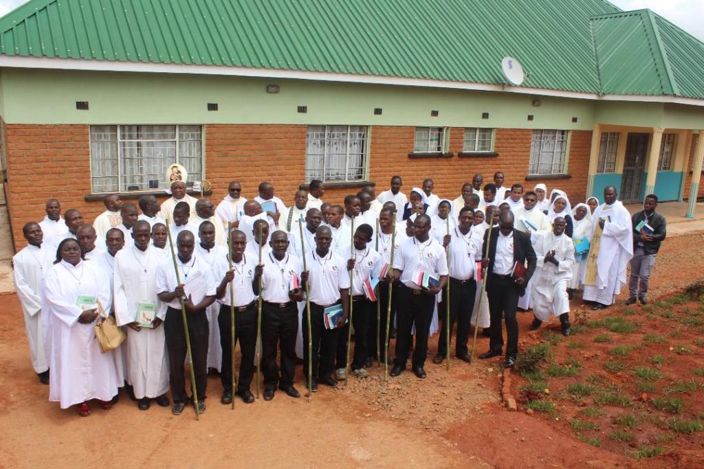 The Commissioned local missionaries with the Bishop