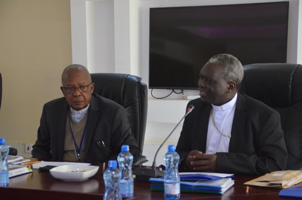 rom Left; H.E Cardianal John Njue, and Archbishop Phili Anyolo