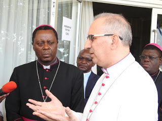 Most Rev. Gianfranco Gallone, New Apostolic Nuncio to Zambia addressing journalist at Kenneth Kaunda Airport, Lusaka upon his arrival. Looking are ZCCB Chairman Rt. Rev. George Lungu and Rt. Rev. Charles Kasonde, Chairman of AMECEA and Bishop of Solwezi