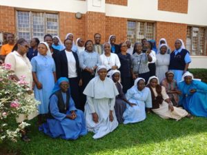 Sisters in a group photo during Africa Faith and Justice networkworkshop
