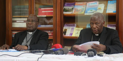 Rt. Rev. Joseph Anthony Zziwa (right), the chairman of the  Uganda Episcopal Conference (UEC) and Bishop of  Kiyinda-Mityana Diocese and Msgr. John Baptist Kauta,  the Secretary General of UEC