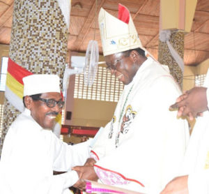 Bishop Banzi is congratulated by other Faith Leaders