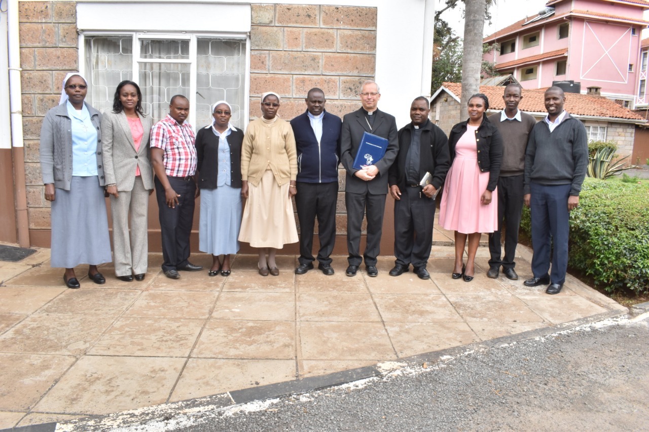 The Apostolic Nuncio to Kenya and South Sudan His Excellency Archbishop Bert van Megen with a section of AMECEA Secretariat Staff. 