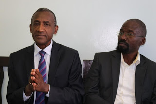 Dr. Wahome Ngare from Kenya Catholic Doctors Association  (left) and Mr. Richard Kakeeto from Center for Social Justice at the Catholic University of Eastern Africa 