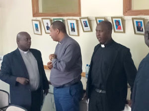 Fr Bundi interacting