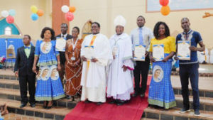 Radio Maria Volunteers with Bishop Stima and Fr. Kimu