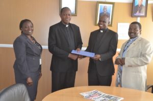From left, KCCB – Human Resource Officer Hellen Rutto, Former AMECEA Secretary General, Very Rev. Fr. Ferdinand Lugonzo, Outgoing Director, Rev. Fr. Calisto Nyagilo and KCCB Deputy General Secretary, Rev. Fr. Lucas Ong’esa