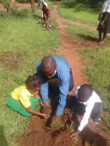 Likuni parish Tilitonse Children planting trees