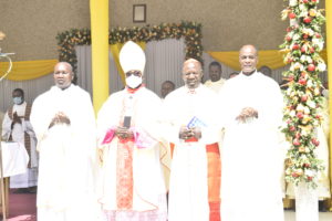 Extreme left Very Rev. Stephano Musomba, Right Very, Rev. Henry Mchamungu