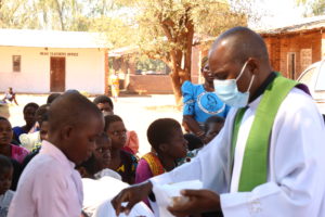 Fr. Mwakhwawa during Mass