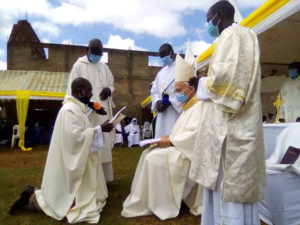 Rev. Fr. Peter Panya being installed as the Parish Priest of St. Mary Immaculate Conception Loro Parish