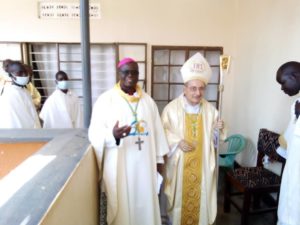 The Papal Nuncio flanked by Bishop Sanctus Lino Wanok on the left shortly after the Eucharistic celebration at St Francis Xavier Dokolo Catholic parish. (1)