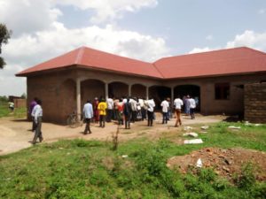 Members of Abongodyang Sub Parish Pastoral Council inspecting Priest's house under construction at Abongodyang