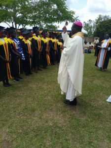 Rt Rev Sanctus Lino Wanok Bishop of Lira Diocese blessing the Graduands shortly after the Eucharistic celebration at Asili Girls Vocational School Lira city.