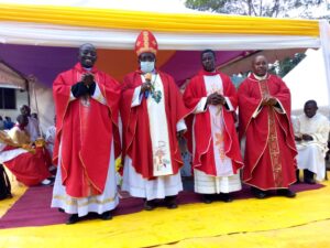 Bishop Kibira with Fr Cosmas Asaba PP Kyalhumba, Fr Andrew Kato and Fr Godfrey Kauta
